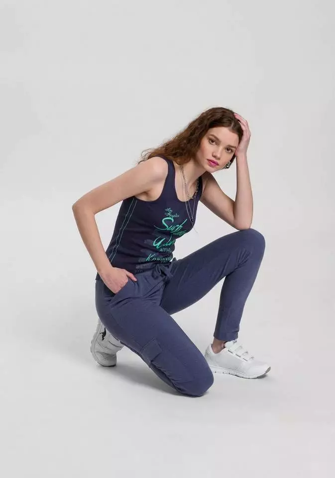 KangaROOS Jogginghose im Cargo-Look mit Gummibund & Tunnelzug - NEUE KOLLEKTION Schwarz, Blau-meliert 4 KangaROOS Jogginghose im Cargo-Look mit Gummibund & Tunnelzug - NEUE KOLLEKTION Schwarz, Blau-meliert – Bild 4